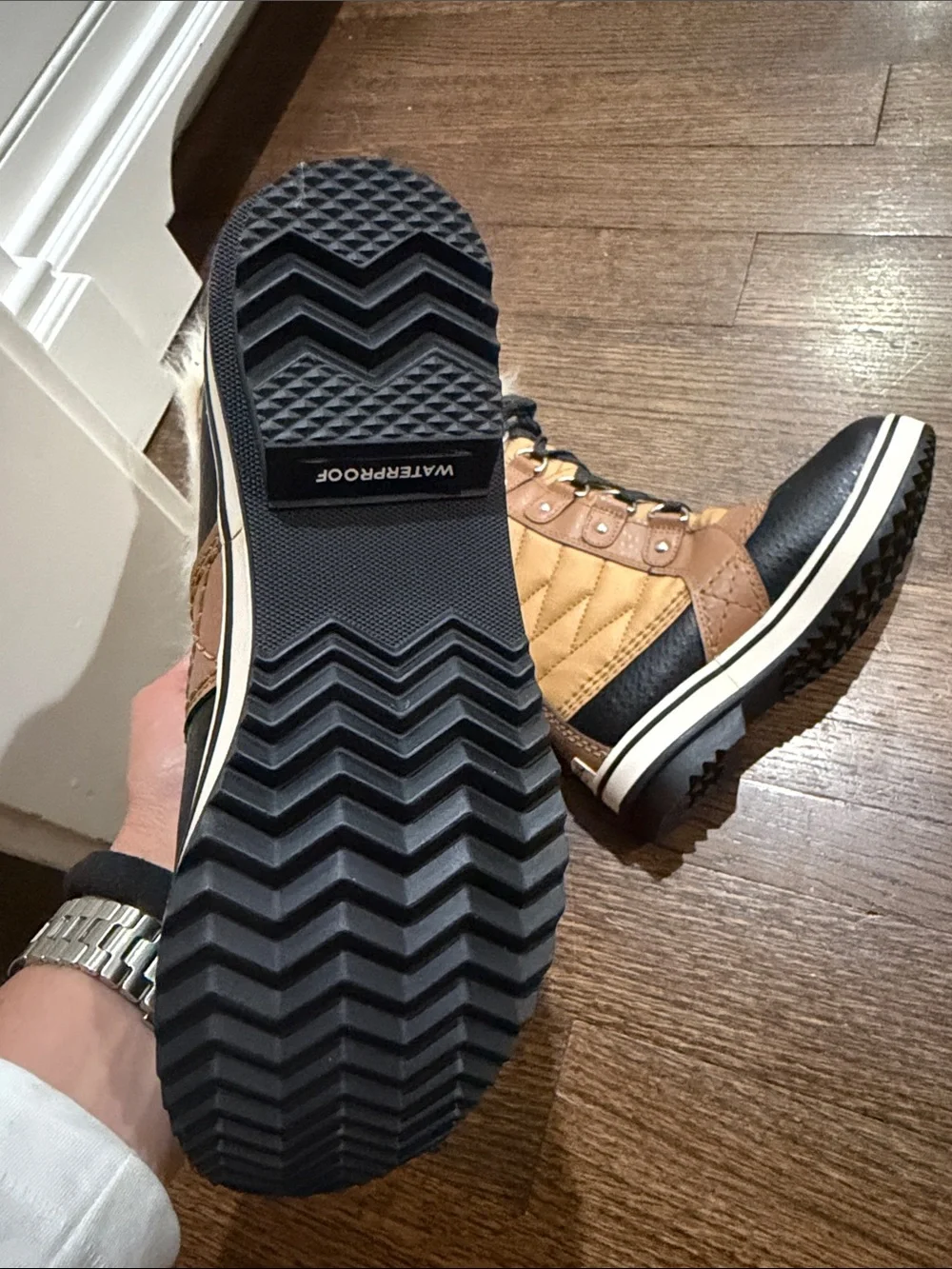 Sorel Kids Lace-Up Winter Boots in Black and Tan with Cream Faux Fur